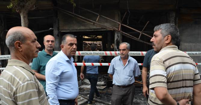  Güney, yanan işyerlerini inceledi